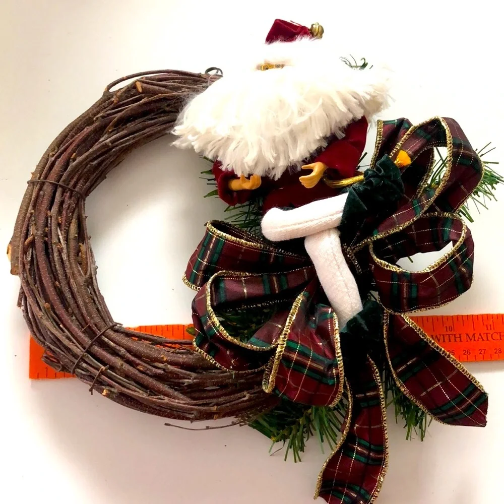 8” grapevine wreath with Santa, ribbon and greenery